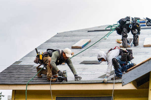 Professional Gutter Installation technician working in Redlands, CA